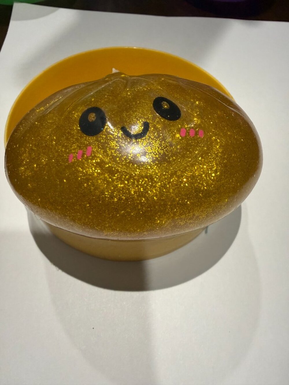 Golden Glitter Dumpling from the Squishy Bun Rainbow Mystery Sugar Edition.